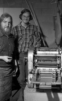 Gary Michaels (beard and apron) and the "Sun-Up Press" printing the Strike News